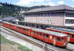 RhB Regionalzug 664 von Arosa nach Chur am 15.05.1995 in Arosa mit ABt 1701I - B 2319 - DZ 4233 - ABDe 4/4 483II Triebwagen schiebend.