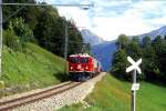 RhB SALON-Extrazug fr GRAUBNDEN TOURS 3658 von Arosa nach Chur am 30.08.1998 unterhalb St.Peter-Molinis mit E-Lok Ge 4/4I 610 - As 1154 - WRS 3821 - As 1141.
