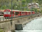 Ein Zug nach Arosa wartet beim Depot Sand auf seine Abfahrt.z.Zt.fahren die Zge nach Arosa wegen Gleisbauarbeiten  in der Stadt Chur von hier aus ab.02.05.06