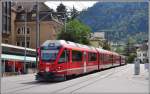 R1440 mit ABe 8/123503 aus Arosa fährt über die Engadinstrasse in den Bahnhof Chur ein.