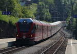 ABe 8/12 3504  Dario Cologna  erreicht mit dem RE 1124 (St.Moritz - Chur) und dem GEX 901 (St.Moritz - Zermatt) den Bahnhof von Filisur.