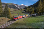 RhB Ge 4/4 III 647  Grüsch  ist mit dem verfrühten Güterzug 5140 von Pontresina nach Landquart am 19.10.2020 bei Bergün/Bravuogn aufgenommen worden.