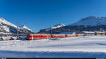 RhB Vorortspendel mit Be 4/4 514 als Ersatzzug für einen RE St. Moritz - Landquart auf dem Abschnitt St. Moritz - Samedan am 16. Januar 2021 in Samedan.
