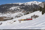 RhB Ge 4/4 I 610 und 605 mit Güterzug 5152 Samedan - Landquart am 24. Februar 2021 bei Bergün.