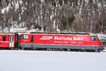Ge 4/4 III 647 schiebt den Schnellzug nach Chur. Es geht leicht Bergauf, da Bild stimmt so !