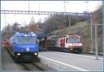 RE1149 nach St.Moritz mit Ge 4/4 III 647  Grsch  begegnet in Filisur R1830 nach Davos Platz mit Ge 4/4 III 641  Maienfeld .