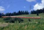 RhB Schnellzug BERNINA-EXPRESS D 500 von Tirano nach Chur am 08.06.1993 oberhalb Bergn mit E-Lok Ge 4/4I 603 und EW-IV-Kompo.