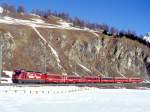 RhB Schnellzug 515 von Chur nach St.Moritz am 26.02.1998 zwischen Samedan und Celerina mit E-Lok Ge 4/4III 641 - D 4223 - B 2360 - B 2378 - B 2493 - A 1283 - A 1263.