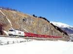 RhB SCHNELLZUG 531 von Chur nach St.Moritz am 26.02.1998 zwischen Samedan und Celerina mit E-Lok Ge 4/4III 643 - D - B - B - B - A - A - B - B.
