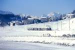 RhB DAMPFZUG fr GRAUBNDEN TOURS 3723 von St.Moritz nach Scuol am 01.02.1998 zwischen Celerina und Samedan mit Dampflok G 4/5 108 - B 2246 - D 4052I - B 2060 - B 2247.