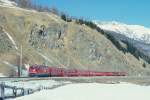 RhB Schnellzug 535 von Chur nach St.Moritz am 26.02.1998 zwischen Samedan und Celerina mit E-Lok Ge 4/4III 648 - D 4216 - B 2435 - B 2381 - B 2392 - A 1281 - A 1272 - B.