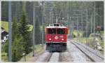 RE1149 mit Ge 6/6 II 703  St.Moritz  kommt uns auf dem Doppelspurabschnitt bei Preda entgegen. (21.06.2012)