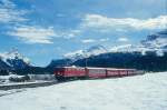 RhB Regionalzug 735 von St.Moritz nach Scuol am 06.03.1998 zwischen Celerina und Samedan mit E-Lok Ge 4/4I 608 - B 2265 - A 1233 - B 2345 - B 2343 - D 4212.