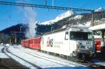 RhB Entlastungs-Schnellzug 1540 von St.Moritz nach Chur am 09.02.1997 in St.Moritz mit E-Lok Ge 4/4 III 643 - B 2327 - B 2224 - B 2375 - As 1141 - A 1253.