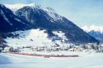 RhB Schnellzug 544 von St.Moritz nach Chur am 02.02.1998 bei Bergn mit E-Lok Ge 4/4III 648 - B 2424 - B 2217 - A 1263 - A 1283 - B 2493 - B 2379 - B 2360 - D 4226.