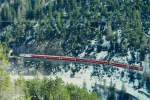 RhB Schnellzug 544 von St.Moritz nach Chur am 03.03.1998 kurz vor Fuegna-Tunnel zwischen Preda und Muot mit E-Lok Ge 4/4III 643 - B - A 1230 - A 1240 - B 2395 - B 2430 - B 2428 - D 4220.