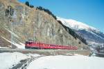 RhB Regionalzug 744 von Scuol nach St.Moritz am 26.02.1998 zwischen Samedan und Celerina mit E-Lok Ge 4/4II 621 - D - 2x B - A - 2x B.