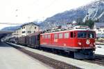 RhB Gterzug 5346 von Pontresina nach Landquart am 16.05.1994 in Samedan mit E-Lok Ge 6/6II 706 - Gakv 5417 - Haikv 5110 - Uaaz 8251 - Uahv 8162 - Uahv 8155 - Uahkv 8153 - Kkw 7324 - Kkw 7335 - Kkw 7338 - Uahr 8163 - Uahkv 8154 - Uahkv 8142 - Uahv 8160 - Uahkv 8105 - Uce 8078 - Haikv 5113 - Haikv 5135 - Gb 5032 - Gbkv 5502 - Gbkv 5540 - Gbkv 5596 - Gb 5063 - Gbkv 5519 - Kkw 7346. Hinweis: gescanntes Dia
