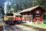 RhB Dampfzug 3549 fr RHTIA INCOMING von Thusis nach Bergn am 24.08.1995 in Stugl mit E-Lok-Vorspann Ge 6/6 I 414 - G 4/5 107 - B 2247 - D 4052I - B 2246.