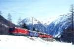 RhB Schnellzug 550 von St.Moritz nach Chur am 02.03.1998 in Spinas mit E-Lok Ge 4/4 III 646 - WR 3811 - A 1272 - A 1281 - B 2392 - 2x B - D.