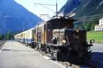 RhB Salonzug 3051 fr GRAUBNDENTOURS von Klosters nach St.Moritz am 25.08.2000 in Preda mit E-Lok Ge 6/6 I 412 - D 4062 - As 1143 - As 1144 - As 1142 - As 1141. Hinweis: Gegenlichtaufnahme, gescanntes Dia
