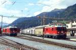 RhB Gterzug 5552 von St.Moritz nach Landquart am 04.09.1996 in Samedan mit E-Lok Ge 4/4 II 619 - Haikqy 5167 - Uce 8083 - Uce 8050 - Uace 7991 - Ucek 8054 - Uce 8037 - Gbkv 5525 - Gbkv 5512 - Gbkv