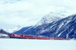 RhB Schnellzug 560 von St.Moritz nach Chur am 07.03.1998 im Val Bever zwischen Bever und Spinas mit E-Lok Ge 4/4 III 641 - B - 2x AB - D - FO PS 4011 - A 1241 - A 1228 - B 2391 - B 2377 - B 2358 - D