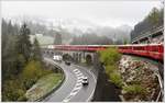 RE1121 mit der Ge 4/4 III 641  Maienfeld  auf dem Soliser Viadukt und nahe an der Schneegrenze. (27.04.2017)