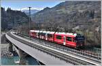 S2 1566 mit ABe 4/16 3105 nach Chur auf der Hinterrheinbrücke in Reichenau-Tamins.