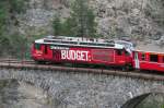 Ge 4/4 III 646  Sta. Maria/Val Mstair  mit  RhB-Budget  Eigenwerbung fr den  Ferienpass Graubnden  hier am 2.05.2007 auf dem Landwasserviadukt bei Filisur.