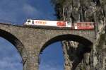 Ge 4/4 III 641  Maienfeld  mit Werbung fr die Supermarktkette  coop  hat soeben den Landwasser-Tunnel verlassen und fhrt nun auf dem gleichnamigen Landwasser-Viadukt. (8.10.2008)