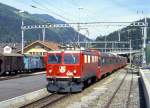 RhB Schnellzug BERNINA-EXPRESS A 501 von Chur nach Tirano am 16.05.1994 in Tiefencastel mit E-Lok Ge 6/6II 606 und EW-IV-Kompo.