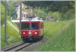 S1 1520 mit Be 4/4 512 kommt bei Farsch zwischen Bonaduz und Reichenau-Tamins durch diesen markanten Einschnitt.