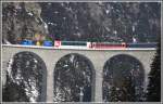 RE1140 mit Ge 4/4 III 652  Vaz/Obervaz Lenzerheide-Valbella  berquert den Landwasserviadukt.