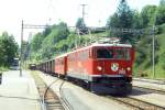 RhB Extra-Gterzug 6545 von Landquart nach Samedan am 27.06.1995 Durchfahrt Filisur mit E-Lok Ge 6/6II 705 - B 2424 - 9x Gb.