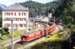 RhB Schnellzug 551 von Chur nach St.Moritz am 09.09.1990 Ausfahrt Reichenau mit E-Lok Ge 6/6 II 701 - AB - D - 3x B - 3x A - 4x B.