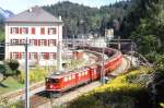 RhB Schnellzug 551 von Chur nach St.Moritz am 09.09.1990 Ausfahrt Reichenau mit E-Lok Ge 6/6 II 701 - AB - D - 3x B - 3x A - 4x B. Hinweis: gescanntes Dia
