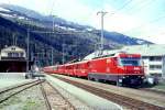 RhB Schnellzug 551 von Chur nach St.Moritz am 12.04.1998 Durchfahrt Cazis mit E-Lok Ge 4/4 III 646 - D 4222 - B 2360 - B 2382 - B 2494 - A 1283 - A 1263- B 2383- Hinweis: Lok ohne Werbung, gescanntes
