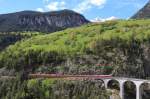 RE 1152 von St. Moritz nach Chur mit Ge 4/4 III 651  Fideris  zwischen dem Landwasserviadukt und dem Zalainttunnel bei Filisur. (19.05.2013)