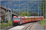 RE1152 mit Ge 4/4 III 642  Breil/Brigels  in Cazis. (14.05.2014)