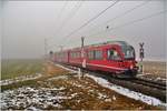 RE1128/BEX903 mit ABe 8/12 3511 bei Bonaduz. (21.12.2016)