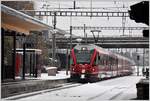 RE1128 mit ABe 8/12 3515 nach Chur in Felsberg.