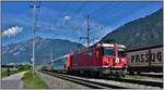 Glacier Express PE904 mit Ge 4/4 II 614  Schiers  in Felsberg.