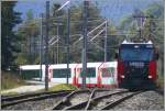 Ge 4/4 III 648  Susch  mit den beiden Glacier Express 906 und 908 von Zermatt nach St.Moritz bei der Ausfahrt aus Reichenau-Tamins Richtung Chur. (14.09.2009)