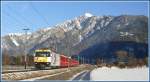 RE1149 nach St.Moritz mit Ge 4/4 III 645  Tujetsch  durchfhrt die Ebene zwischen Chur West und Felsberg. Der Montalin 2266m bildet den Hintergrund. (03.12.2009)