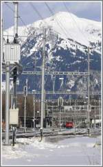 Die Eisenbahn mal ganz klein. Ge 6/6 II 707  Scuol  in Untervaz-Trimmis vor dem Vilan 2376m /M. (20.12.2010)