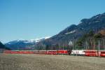 RhB Schnellzug 534 von St.Moritz nach Chur am 27.02.1998 bei Domat/Ems mit E-Lok Ge 4/4III 646 - B 2382 - WR 3816/17 - A 1230 - A 1240 - B 2495 - B 2430 - B 2428 - D 4220 mit Zugkreuzung 535 mit Ge