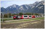 GlacierExpress 908 nach St.Moritz mit Ge 4/4 III 646  Sta.Maria-Val Mstair  zwischen Chur West und Felsberg. (17.10.2012 mit erstem Schnee im Hintergrund)