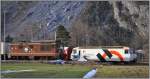 Re 425 165  Moutier  BLS und Ge 4/4 III 649  Lavin  RhB in Felsberg. (31.01.2013)