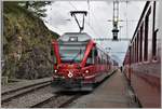 Berninaexpress 950 mit ABe 8/12 3509 nach Chur beim Halt in Alp Grüm.
